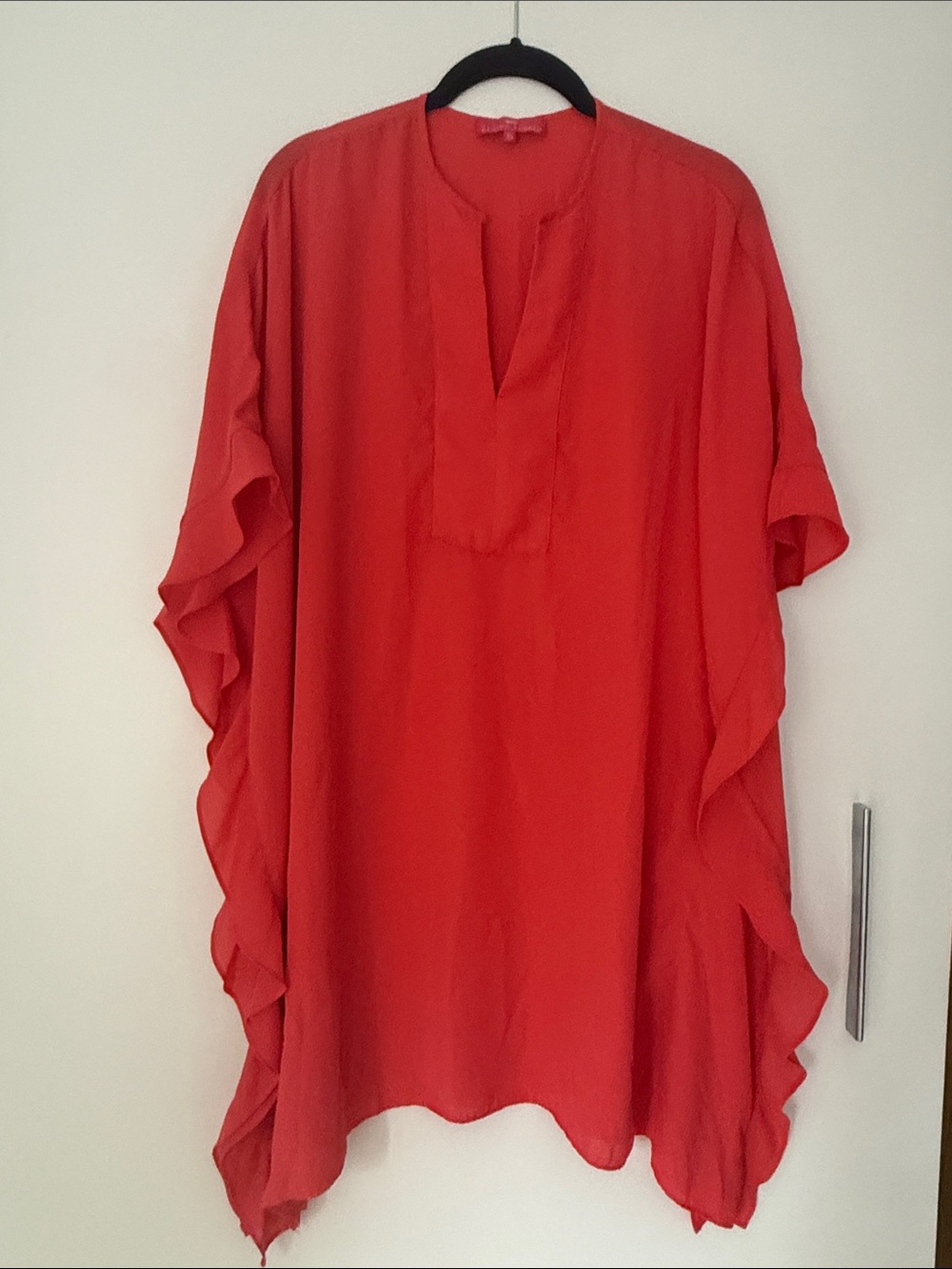 Coral fluttery coverup by Elaine Turner